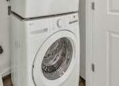 Thumbnail 60 of 81 - A white washing machine is stacked on top of another white washing machine at Marketside Villas at Verrado, Buckeye, AZ