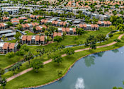 Thumbnail 2 of 20 - A residential area with houses and a fountain.