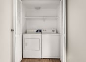 Thumbnail 23 of 48 - a small laundry room with a washer and dryer at Denim Scottsdale, Arizona