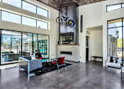 Thumbnail 16 of 24 - Clubhouse with TVs and Entertainment Area at The Premiere at Dana Park, Arizona