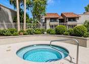 Thumbnail 5 of 20 - A small round pool with a metal railing around it.