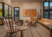 Thumbnail 10 of 76 - a living room with couches and chairs and a tableat Weylyn Luxury Apartments, Laveen