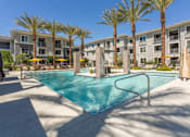Thumbnail 1 of 52 - 1-Bedroom Luxury Apartments In North Phoenix, AZ - The Amelia - Stunning Pool And Spa with Poolside Cabanas And Seating Areas With Fire Pits.