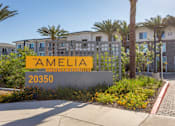 Thumbnail 51 of 52 - A sign for Amelia 20350 is in front of a building.