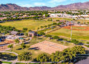 Thumbnail 35 of 35 - A park with a baseball field and a playground.at Marketside Villas at Verrado, Buckeye, AZ, 85396