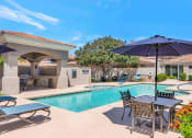 Thumbnail 1 of 37 - a large swimming pool with umbrellas and chairs around it