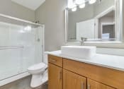Thumbnail 24 of 37 - a bathroom with a sink toilet and a shower