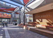 Thumbnail 33 of 37 - a rendering of the entrance to a restaurant with wooden benches