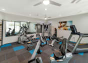 Thumbnail 5 of 37 - the gym in the owners home is equipped with cardio equipment and weights