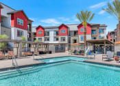 Thumbnail 3 of 76 - our apartments have a swimming pool with a lot of chairs and umbrellasat Weylyn Luxury Apartments, Arizona