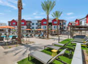 Thumbnail 5 of 76 - an outdoor patio with picnic tables and chairs at the residence onat Weylyn Luxury Apartments, Arizona, 85339