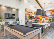 Thumbnail 19 of 76 - a blurry picture of a room with tables and chairsat Weylyn Luxury Apartments, Laveen, AZ