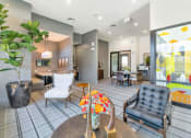 Thumbnail 20 of 76 - a living room with chairs and a tableat Weylyn Luxury Apartments, Laveen, 85339