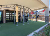Thumbnail 24 of 76 - a fitness center with weights and other equipment in a buildingat Weylyn Luxury Apartments, Arizona, 85339