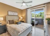 Thumbnail 34 of 76 - a bedroom with a bed and a ceiling fanat Weylyn Luxury Apartments, Laveen, AZ 85339