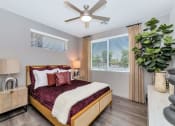 Thumbnail 41 of 76 - a bedroom with a bed and a ceiling fanat Weylyn Luxury Apartments, Laveen, 85339