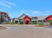Thumbnail 73 of 76 - an empty parking lot in front of an apartment buildingat Weylyn Luxury Apartments, Laveen, AZ