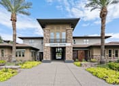 Thumbnail 47 of 51 - A building with a leasing center sign in front of it. at The Laurel Apartments, Chandler, AZ 85286  