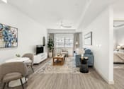 Thumbnail 17 of 26 - Spacious living room with vaulted ceiling at Lucero Apartments, Phoenix, Arizona