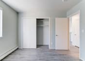 Thumbnail 5 of 21 - Closet In Bedroom at Johnson Legacy Apartments, Milwaukee, Wisconsin