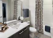 Thumbnail 13 of 26 - Model Bathroom with Tub at 30339 Apartments for Rent