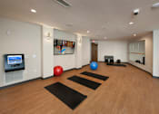 Thumbnail 16 of 26 - Yoga Studio and Gym at Atlanta Apartments Near Cumberland Mall