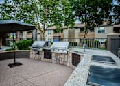 Thumbnail 21 of 24 - Outdoor Barbeques at River Walk Apartments
