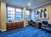 Thumbnail 25 of 29 - Resident Business Center with Computer and WiFi Access at Dallas Apartments near Galleria Mall