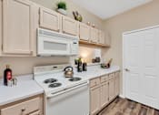 Thumbnail 12 of 22 - White Appliances In Modern Rental Home Kitchen