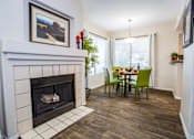 Thumbnail 9 of 20 - Catalina Foothills Apartments Spacious Living Room with Fireplace