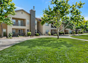 Thumbnail 11 of 24 - Manicured Landscaping at 1 and 2-Bedroom Albuquerque Apartments for Rent
