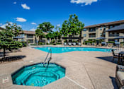 Thumbnail 19 of 24 - Resort Style Swimming Pool and Spa at River Walk at Puerta de Corrales Apartments in Albuquerque, NM