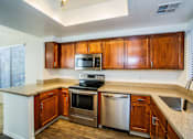 Thumbnail 7 of 20 - Kitchen with Stainless Steel Appliances at Apartments near University of Arizona