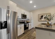Thumbnail 7 of 28 - Brand New Apartment Kitchen with Stainless Steel Appliances