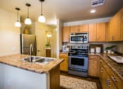 Thumbnail 10 of 22 - Avondale Arizona Apartments with Gourmet Kitchen and Stainless Steel Appliances