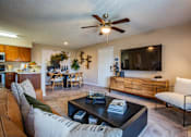 Thumbnail 5 of 24 - Large Living Room with Ceiling Fan at Apartment Home in Albuquerque
