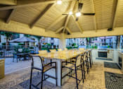 Thumbnail 11 of 22 - BBQ Grills & Outdoor Kitchen at Apartments in Phoenix AZ