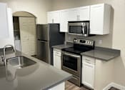 Thumbnail 7 of 16 - Upgraded Kitchen in West Valley City Apartments for Rent