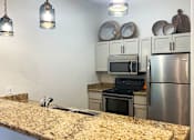 Thumbnail 10 of 25 - Community Kitchen at Apartments on Happy Valley Rd Arizona