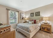 Thumbnail 11 of 16 - Bed and Nightstand in 1, 2, 3 Bedroom Apartments NM
