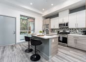 Thumbnail 21 of 26 - a kitchen with a counter top and a sink at Lido Apartments - 4025 Grandview, Culver City, CA