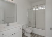 Thumbnail 10 of 18 - Hardwood floor bathroom at 7393 West Manchester Avenue, Los Angeles, CA