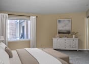 Thumbnail 8 of 26 - A bedroom with a large bed and a painting on the wall.