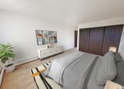 Thumbnail 3 of 19 - our apartments offer a bedroom with a bed and a closet