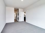 Thumbnail 36 of 44 - empty bedroom with gray carpet and white walls
