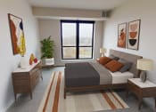 Thumbnail 20 of 44 - a bedroom with a bed and a large window