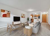 Thumbnail 20 of 21 - A living room with a grey couch, a wooden chair, a television, and a potted plant.