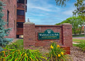 Thumbnail 26 of 26 - a brick wall with a sign that reads welshburn on the park luxury apartments