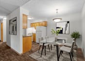 Thumbnail 1 of 14 - Kitchen and dining area