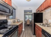 Thumbnail 17 of 20 - Kitchen at Sawgrass Apartments, Charleston, 29412